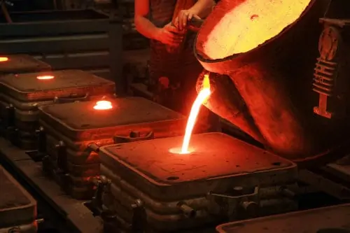 molten-metal-poured-into-sand-casting-mould